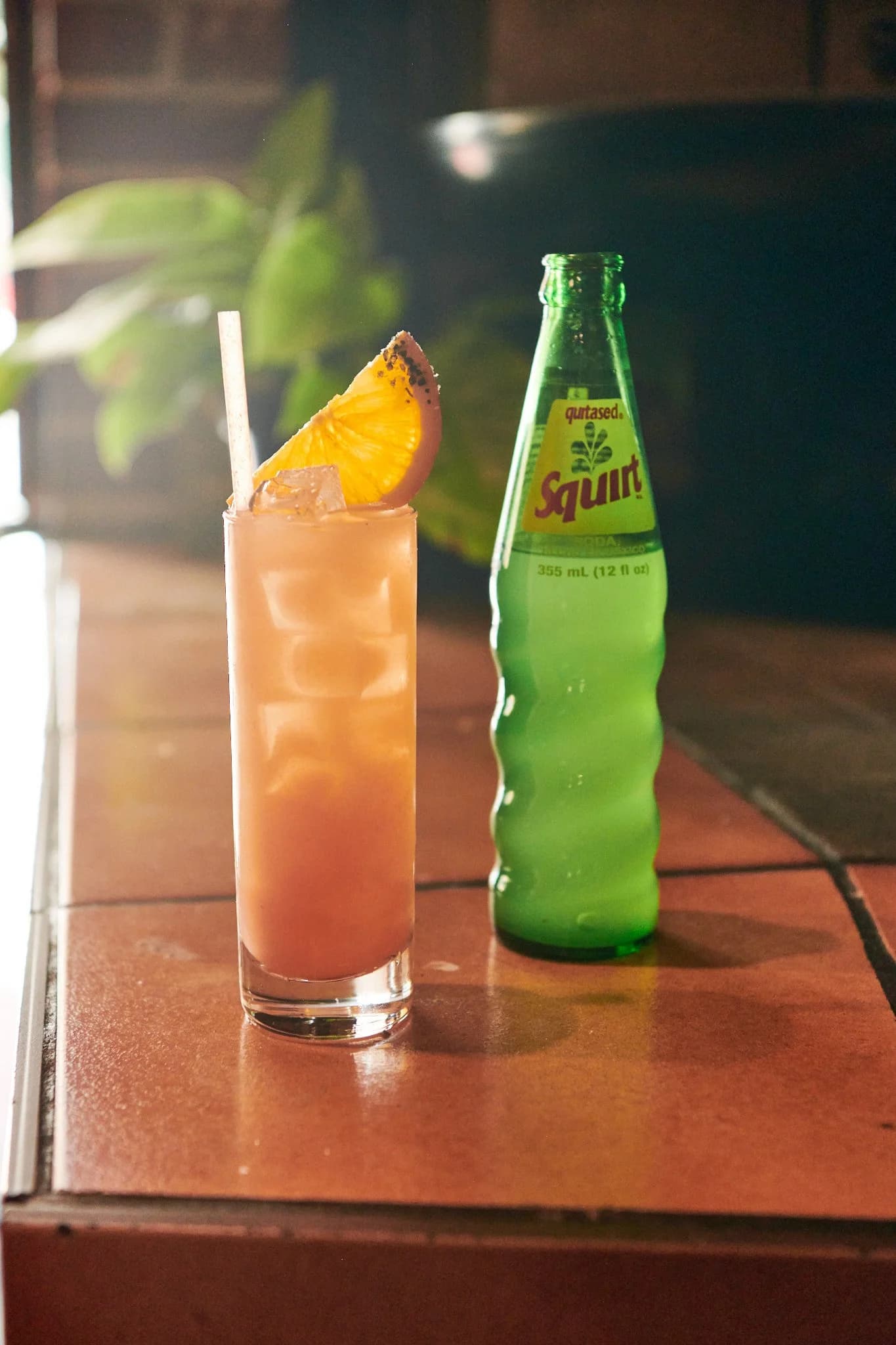 Paloma served with a bottle of Squirt