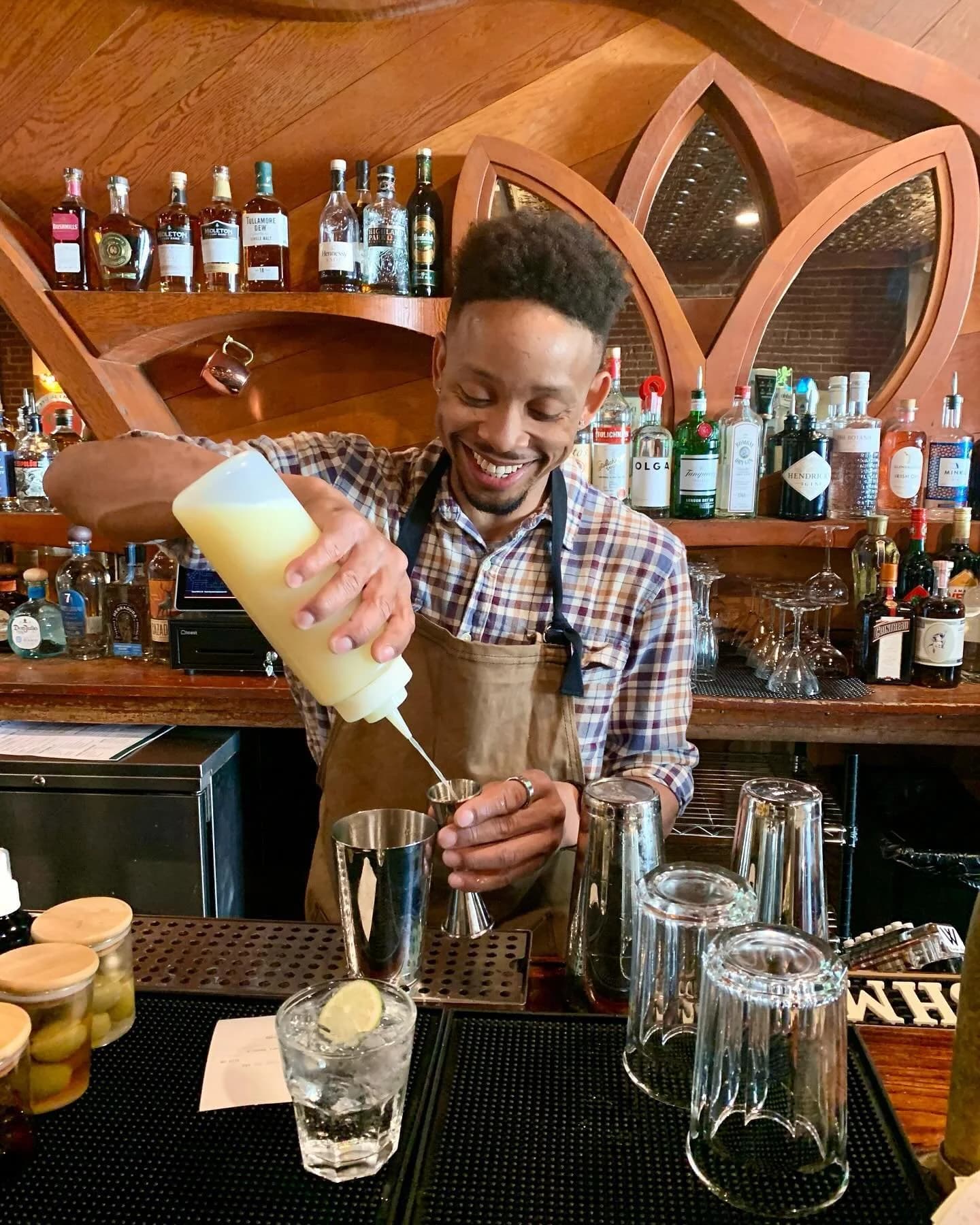 Bartender shaking a cocktail